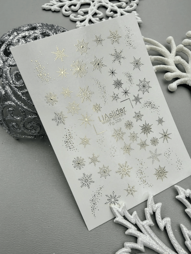 FG-305 gold foil snowflakes with dot accents nail decals close up